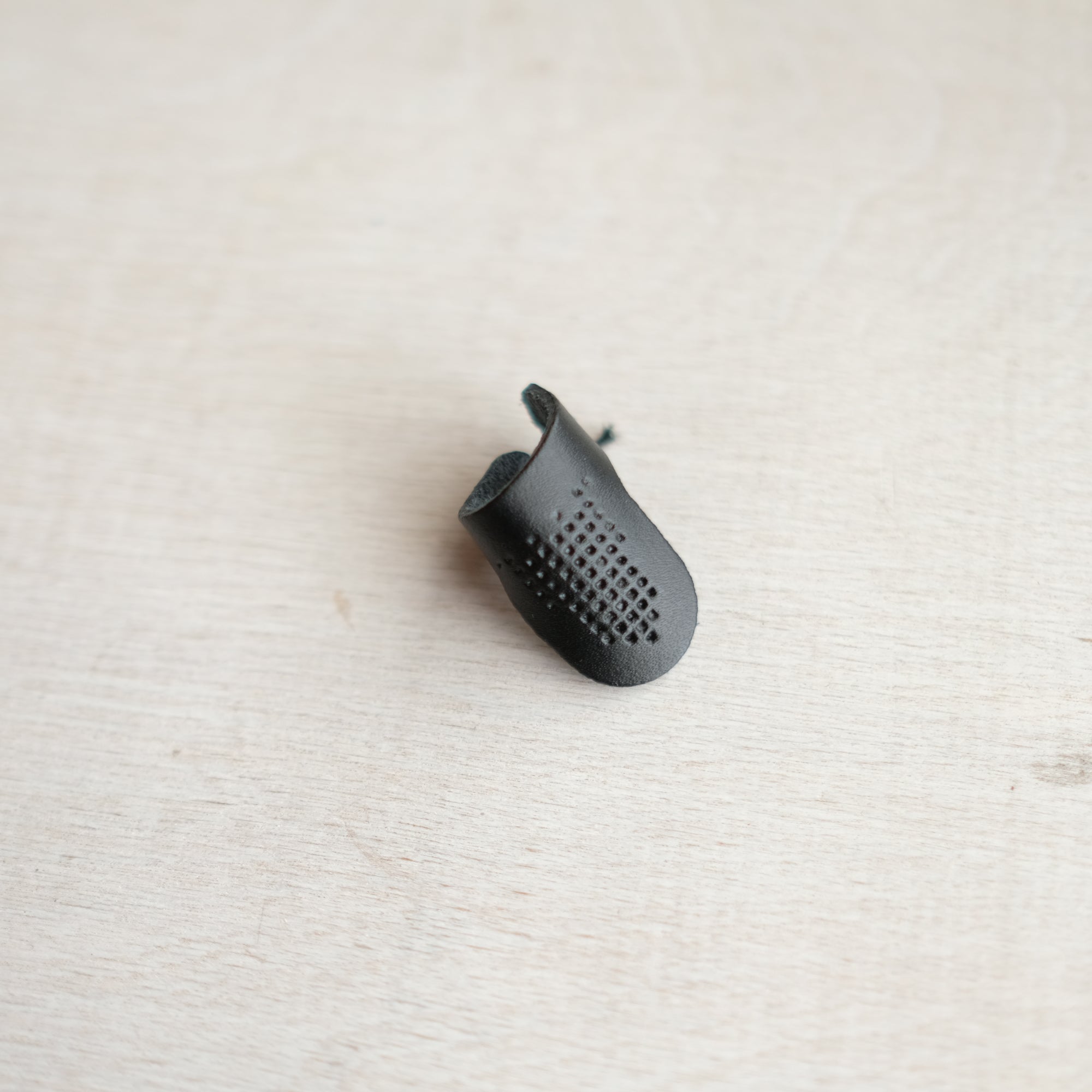 Label: Olympus Leather Adjustable Thimble