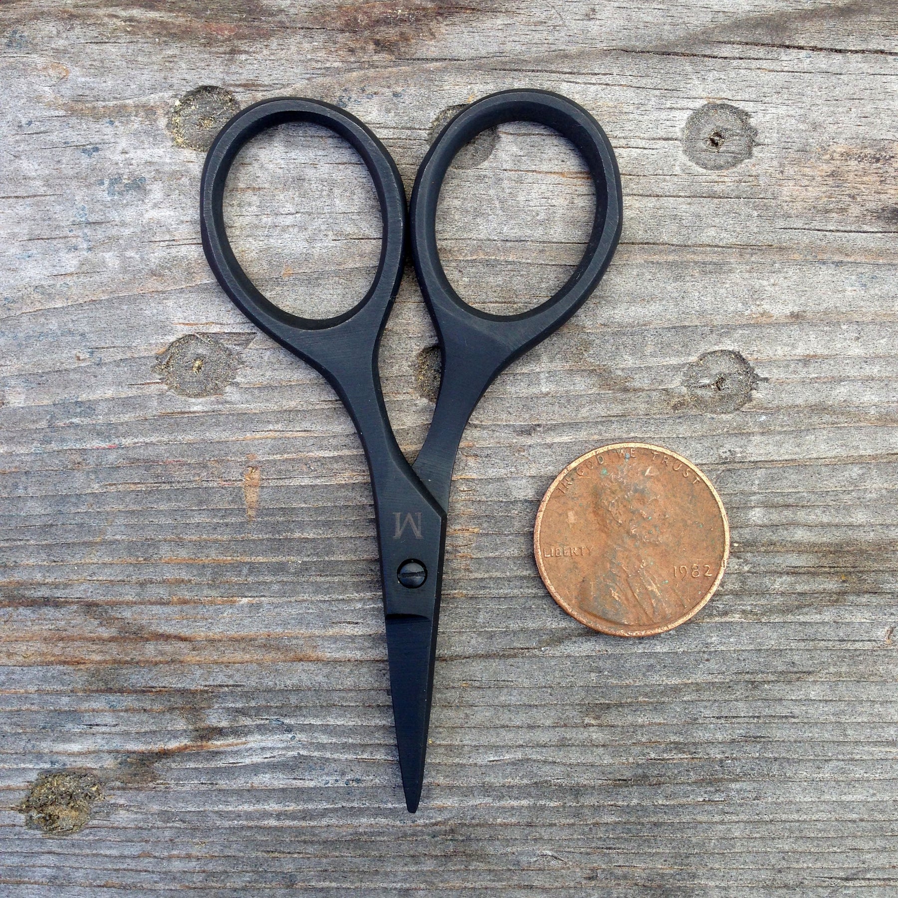 label: Buttonhole Scissors